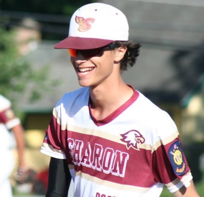 Happy baseball player in shades