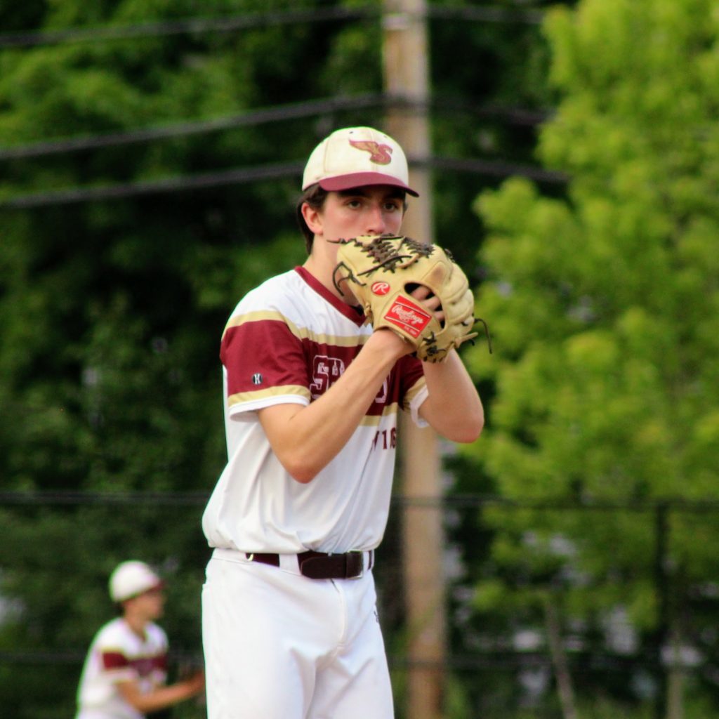 A Sharon pitcher stares down the batter